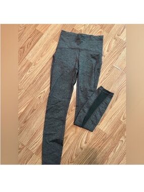 Gray Lululemon leggings with mesh